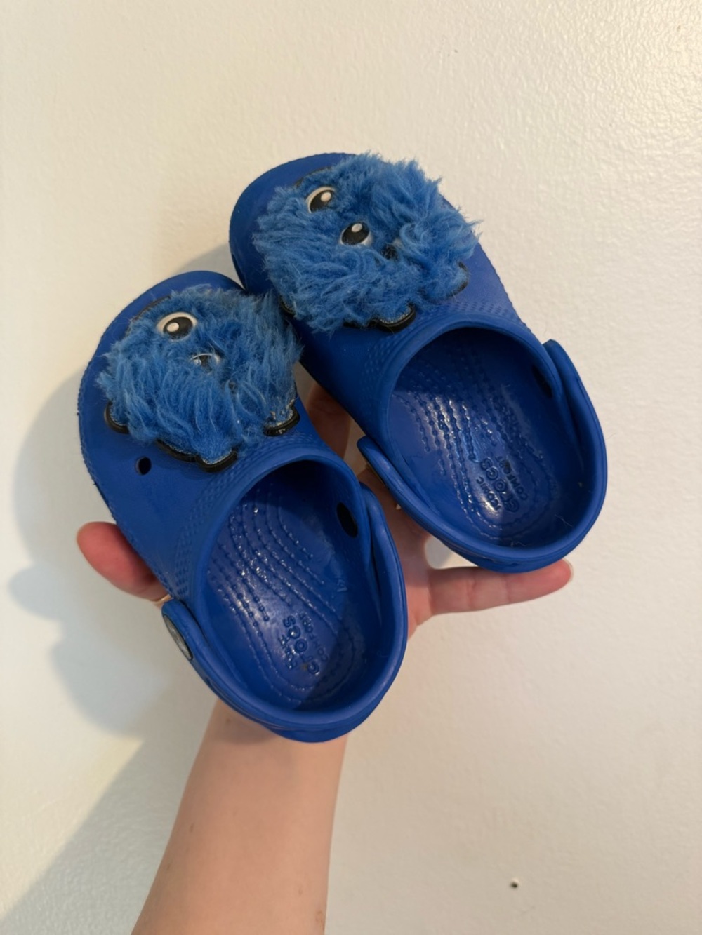 CROCS Kids Royal Blue Clog Sandals with Furry Monster Charm